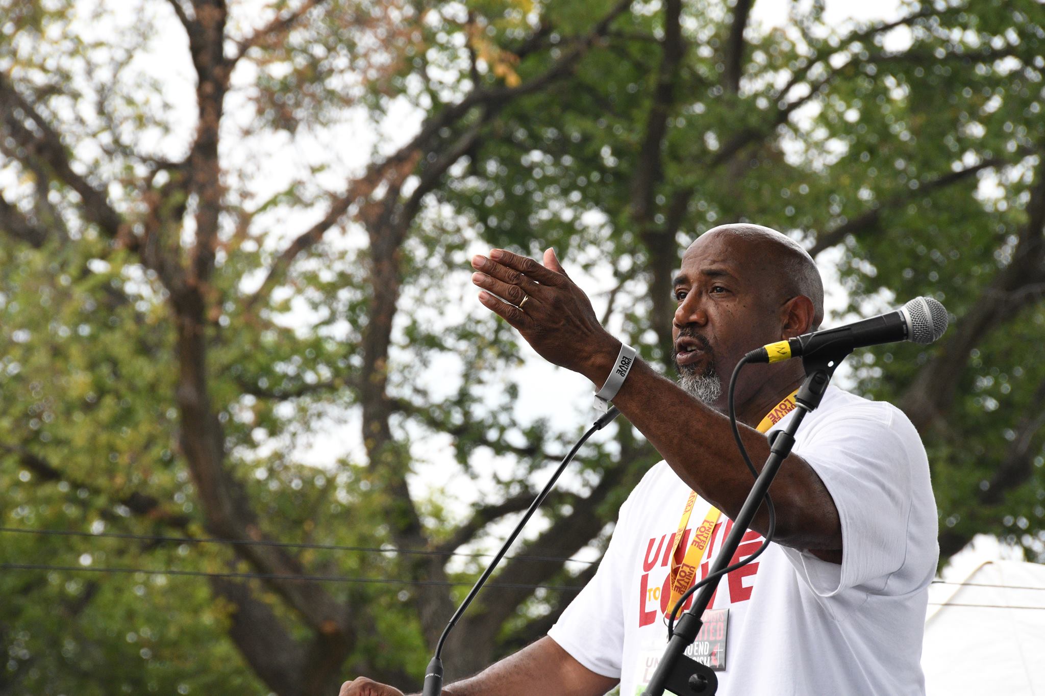 Rev. Joe Daniels speaking at the United to love rally