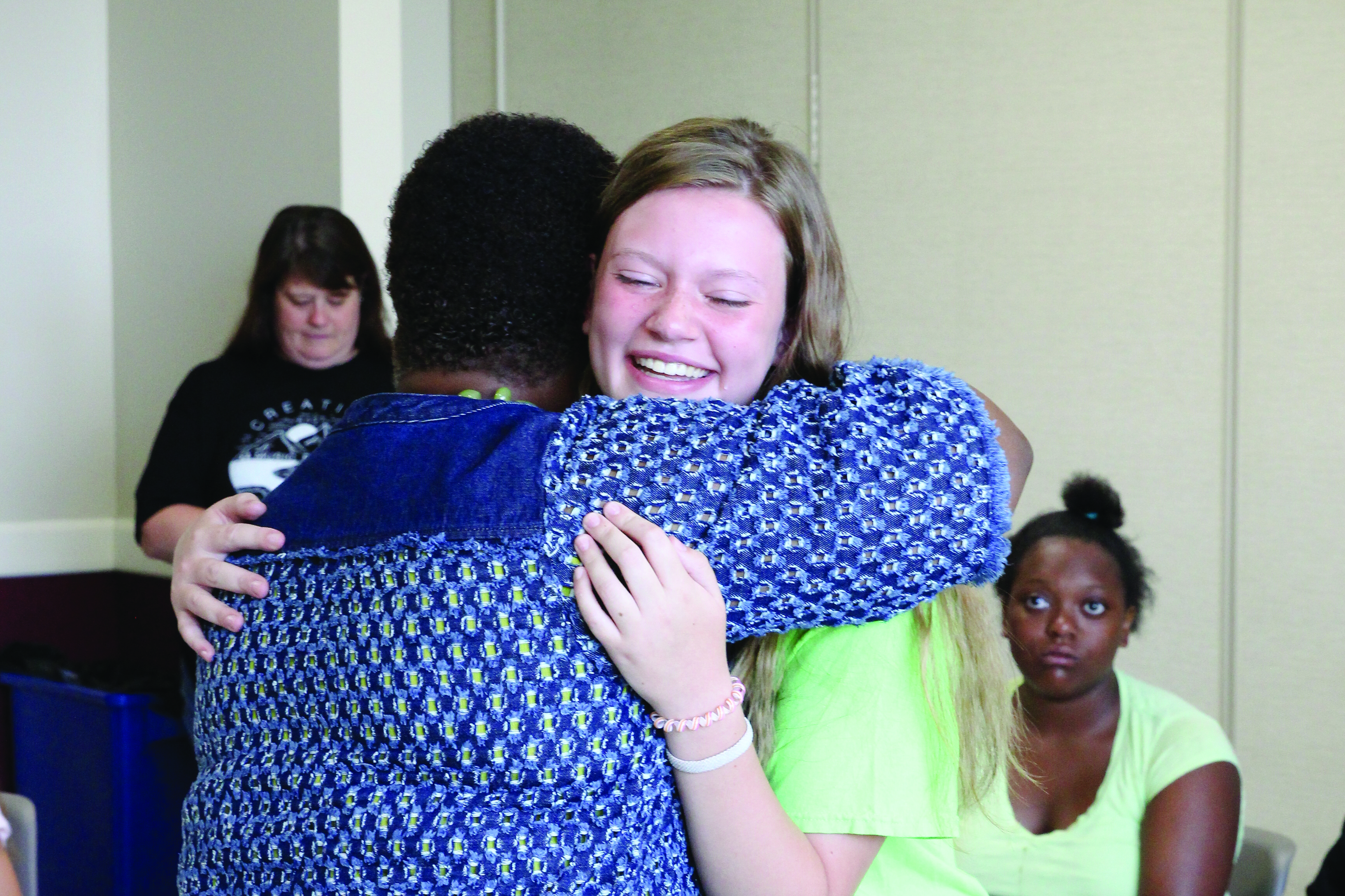 Bishop LaTrelle Easterling embraces LeadHERship campers at West River