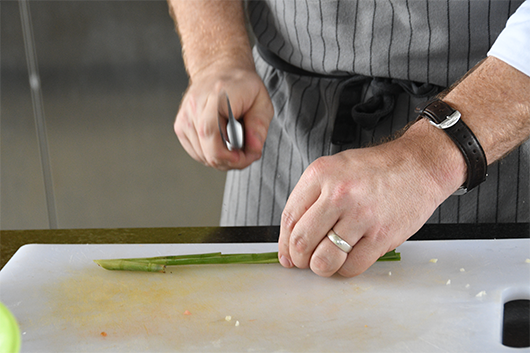 A chef chopping veggies